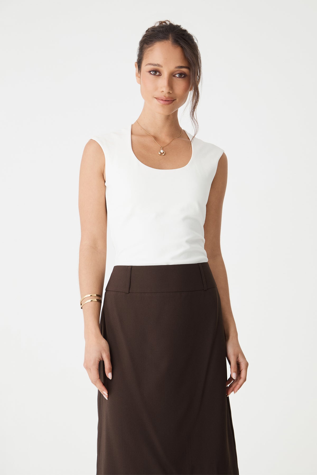Close-up front view of the rounded square neckline and cap sleeves