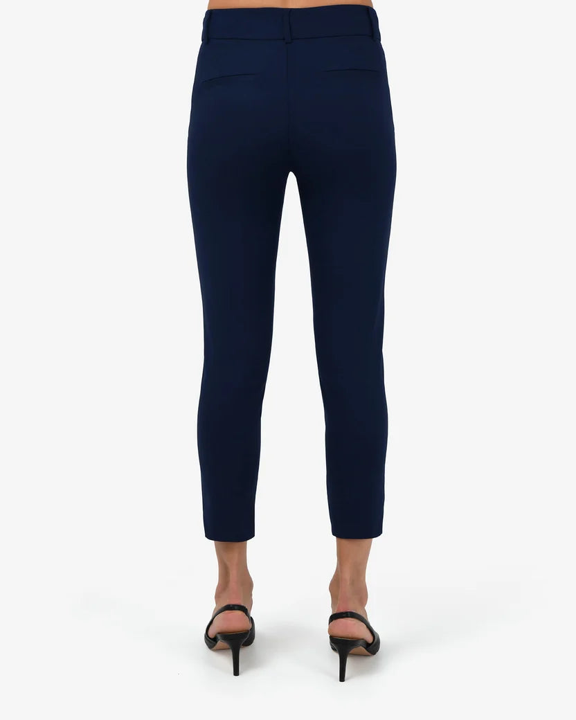 Back view showing faux back welt pockets and cropped hem
