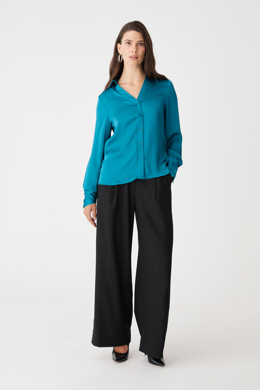 Lila V-Neck Satin Blouse in aquamarine, front view worn with black wide-leg trousers