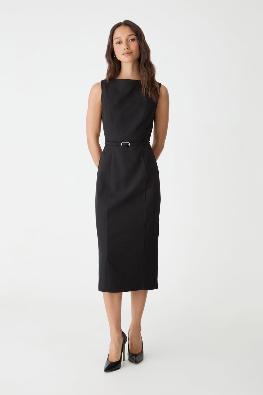 Mila Pencil Midi Dress in black, front view with slim belt at the waist, worn with black heels