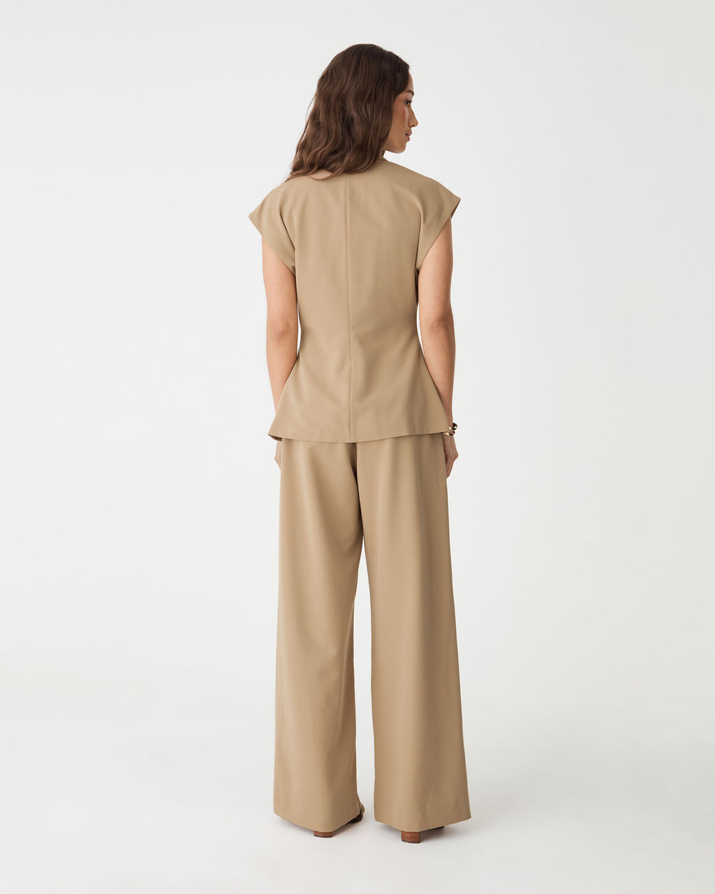 Back view of the camel blazer and matching wide leg pants