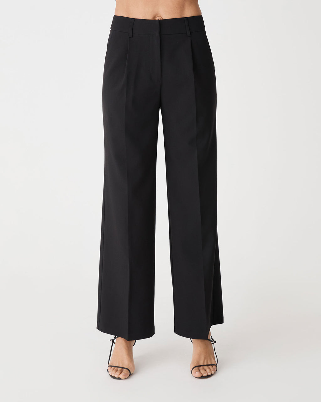 Front view of the black Nikki Tailored Pants, high waisted wide straight leg with front pleats