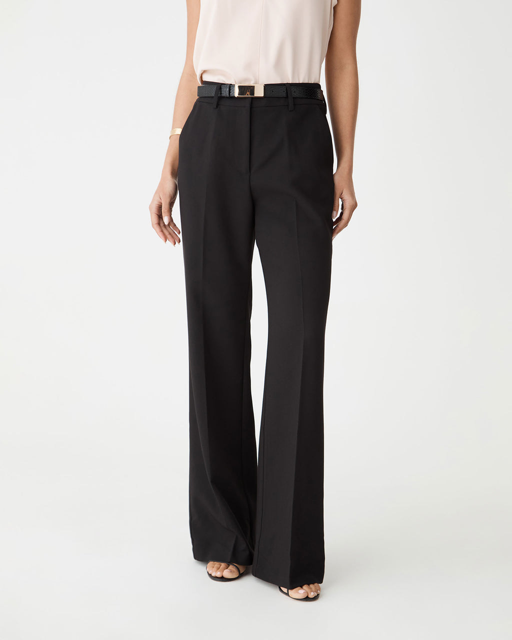 Front close-up of the black Nikki Flared Leg Pants high waistband with belt