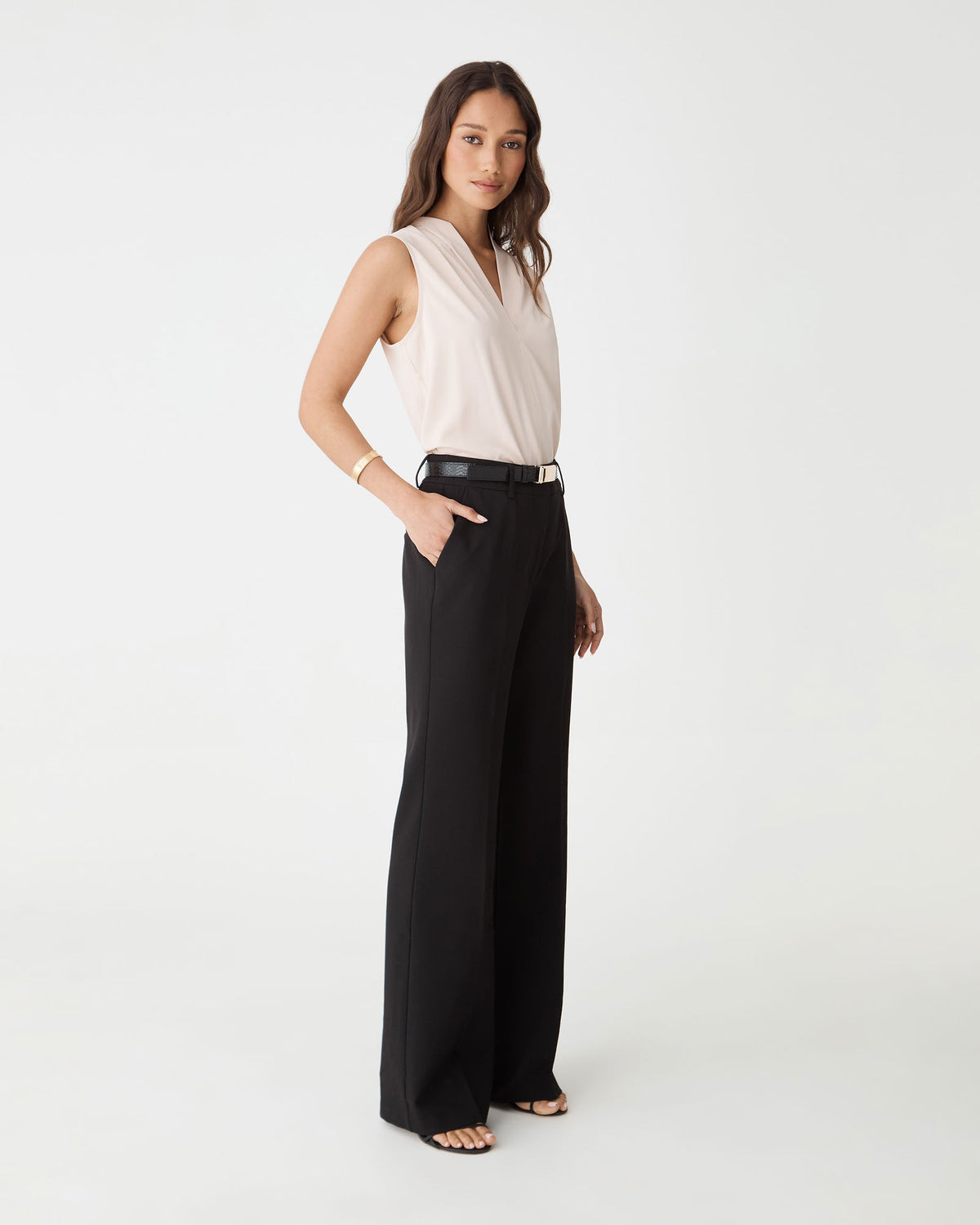 Side view of the black Nikki Flared Leg Pants showing the flared leg