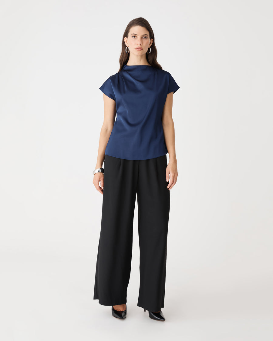 Zafina Pleated Draped Top in navy, front view worn with black wide-leg trousers