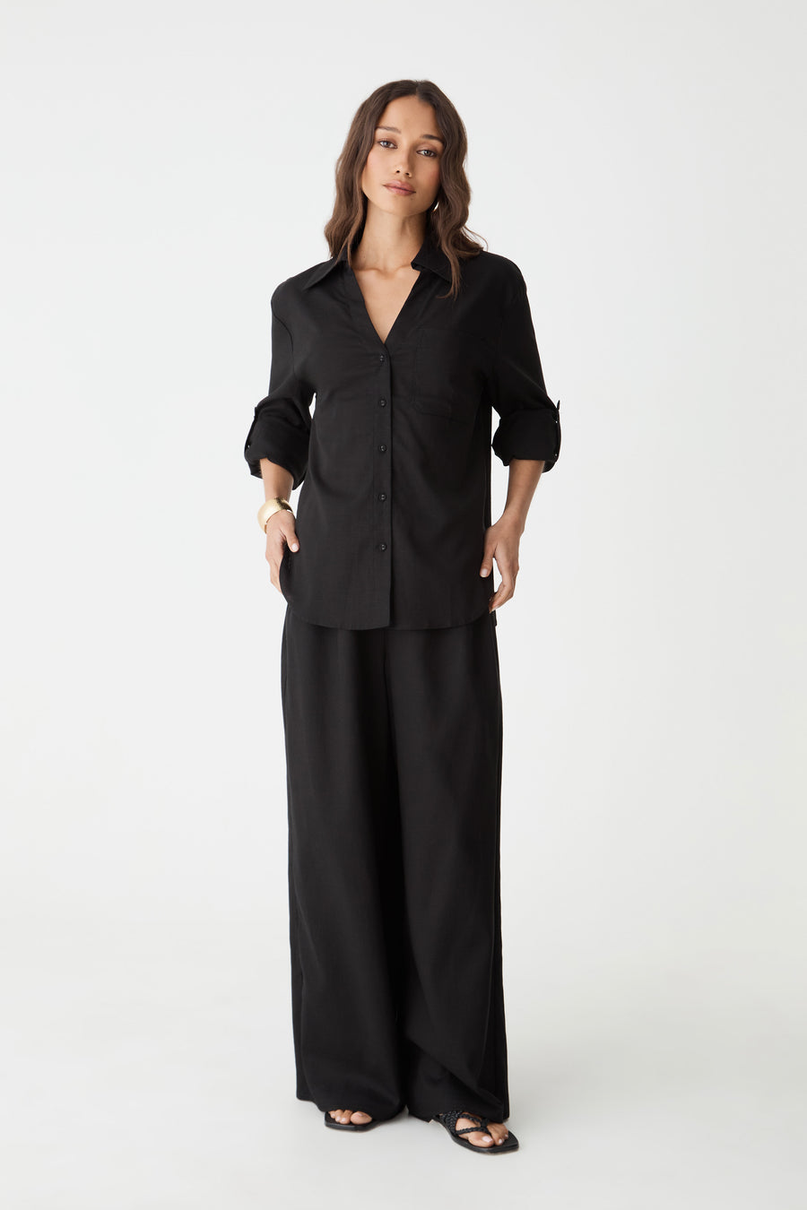 Jazie Tencel Linen Tab Shirt in black, front view worn open-neck with black wide-leg pants