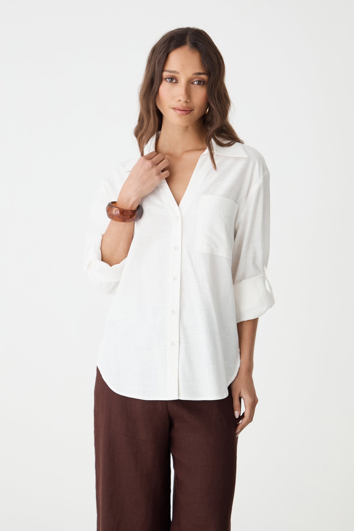 Jazie Tencel Linen Tab Shirt in ivory, front view with rolled tab sleeves and brown wide-leg pants