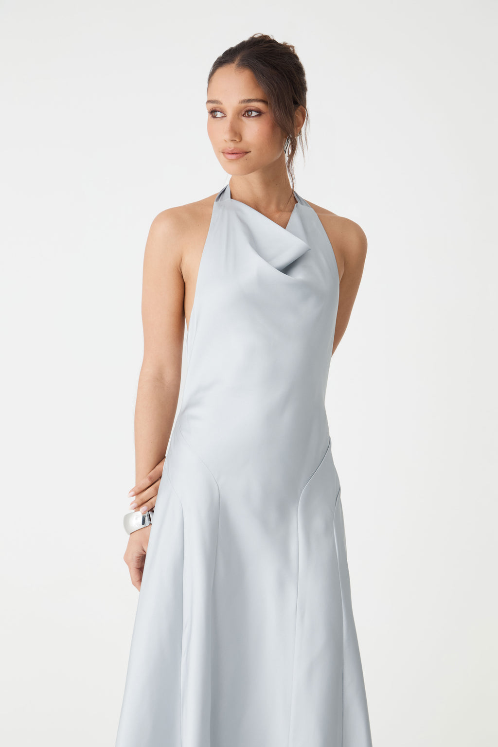 Close-up of the draped cowl halter neckline in powder blue satin