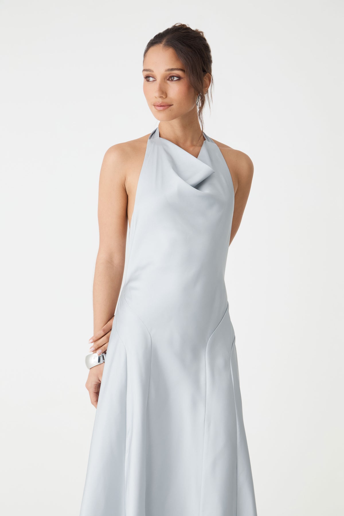 Close-up of the draped cowl halter neckline in powder blue satin