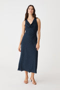 Danielle Bias Cowl Dress in navy spot, front view of sleeveless midi dress with white polka dot print