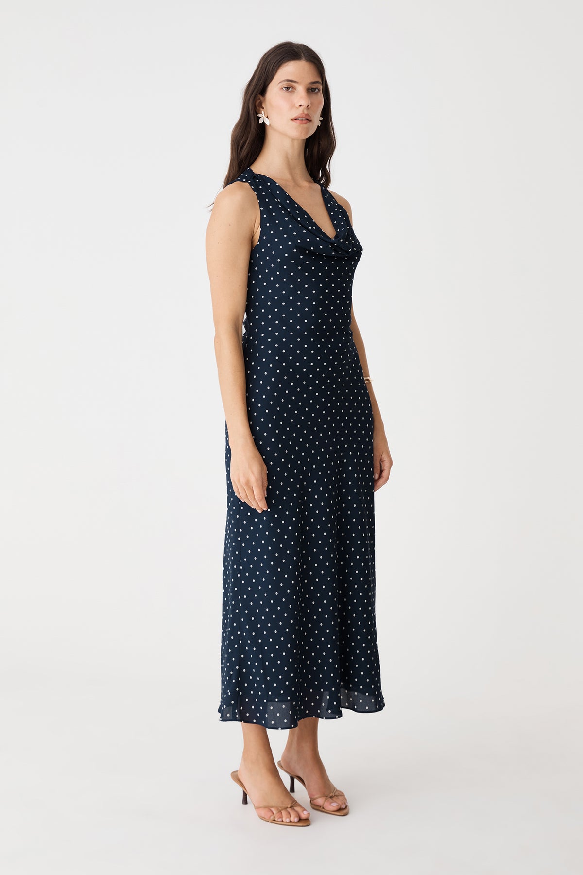 Side view showing the bias-cut midi silhouette
