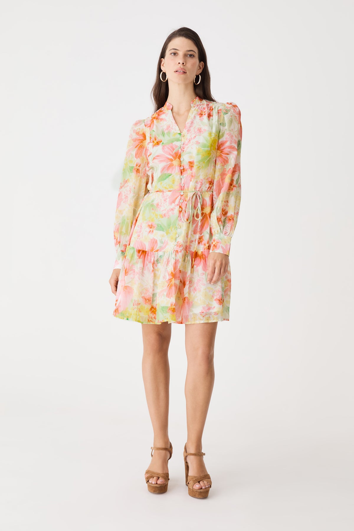 Juliet Long Sleeve Dress in pink floral print, front view of tiered mini dress worn with heeled sandals