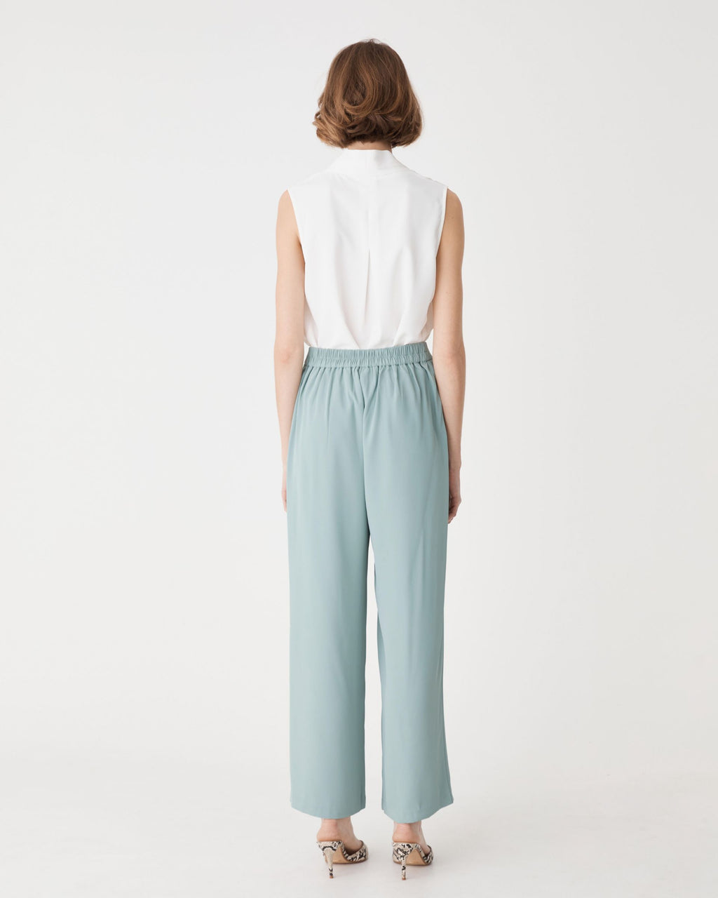 Back view showing the elasticated back waist of the Eucalyptus wide-leg pants