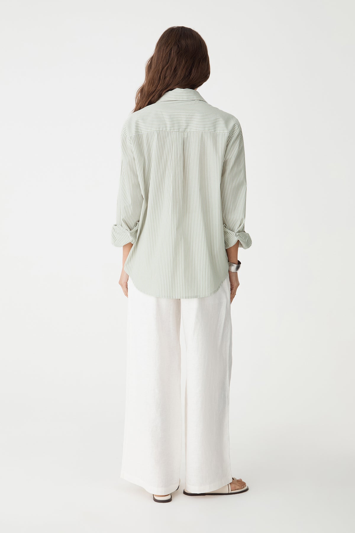 Back view showing the shirred elasticated back waistband of the ivory pants