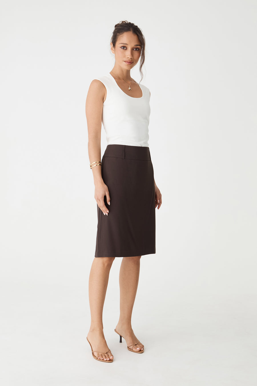 Veronica Straight Crepe Skirt in chocolate, side-angle view worn with a white sleeveless top