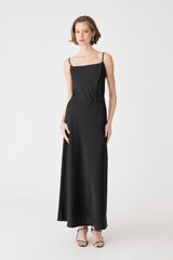 Louise Bias Satin Skirt in black, front view, maxi length worn with a black camisole top