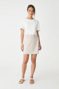 Zoe Pinstripe Mini Skirt in beige pinstripe, front view worn with a white t-shirt