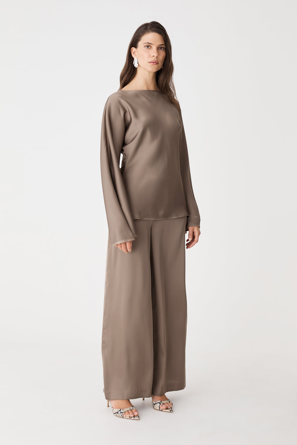 Side view of the mocha satin top with matching wide leg pants