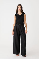 Shayna Bamboo Cowl Top in black, front view worn with black wide-leg trousers and belt