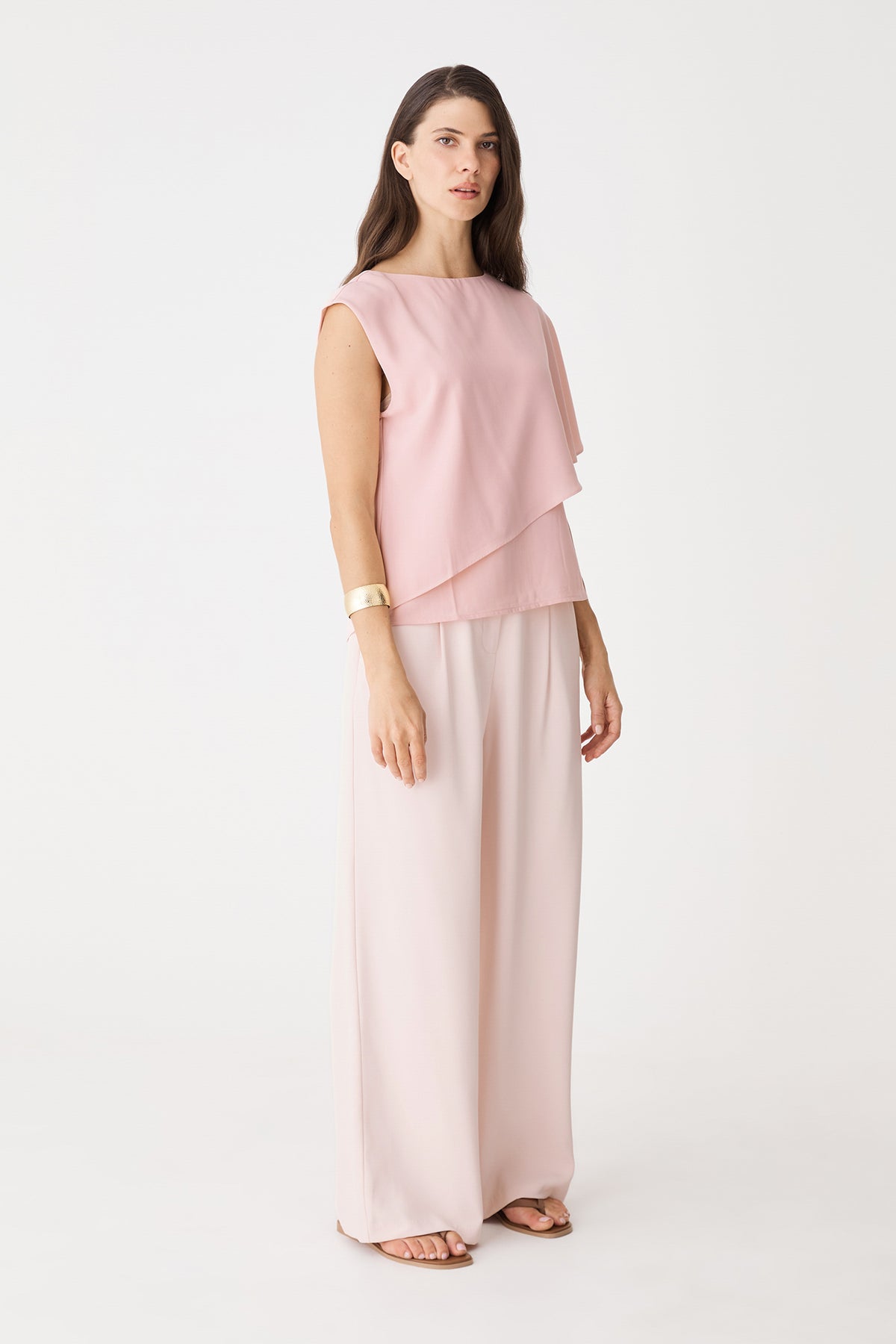 Front view of the dusty pink Cecilia Asymmetric Top with wide-leg trousers