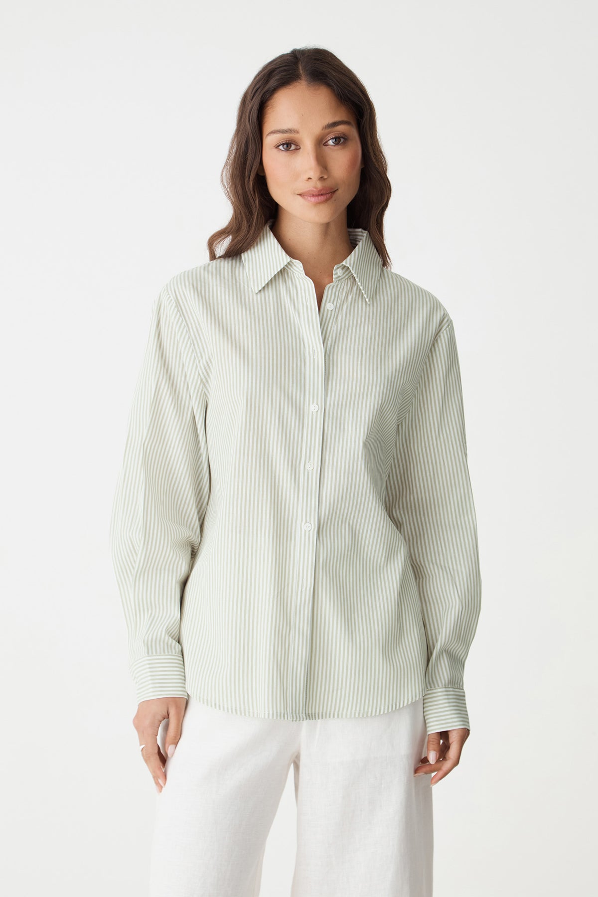 Front close view of the green stripe shirt showing pointed collar and button placket