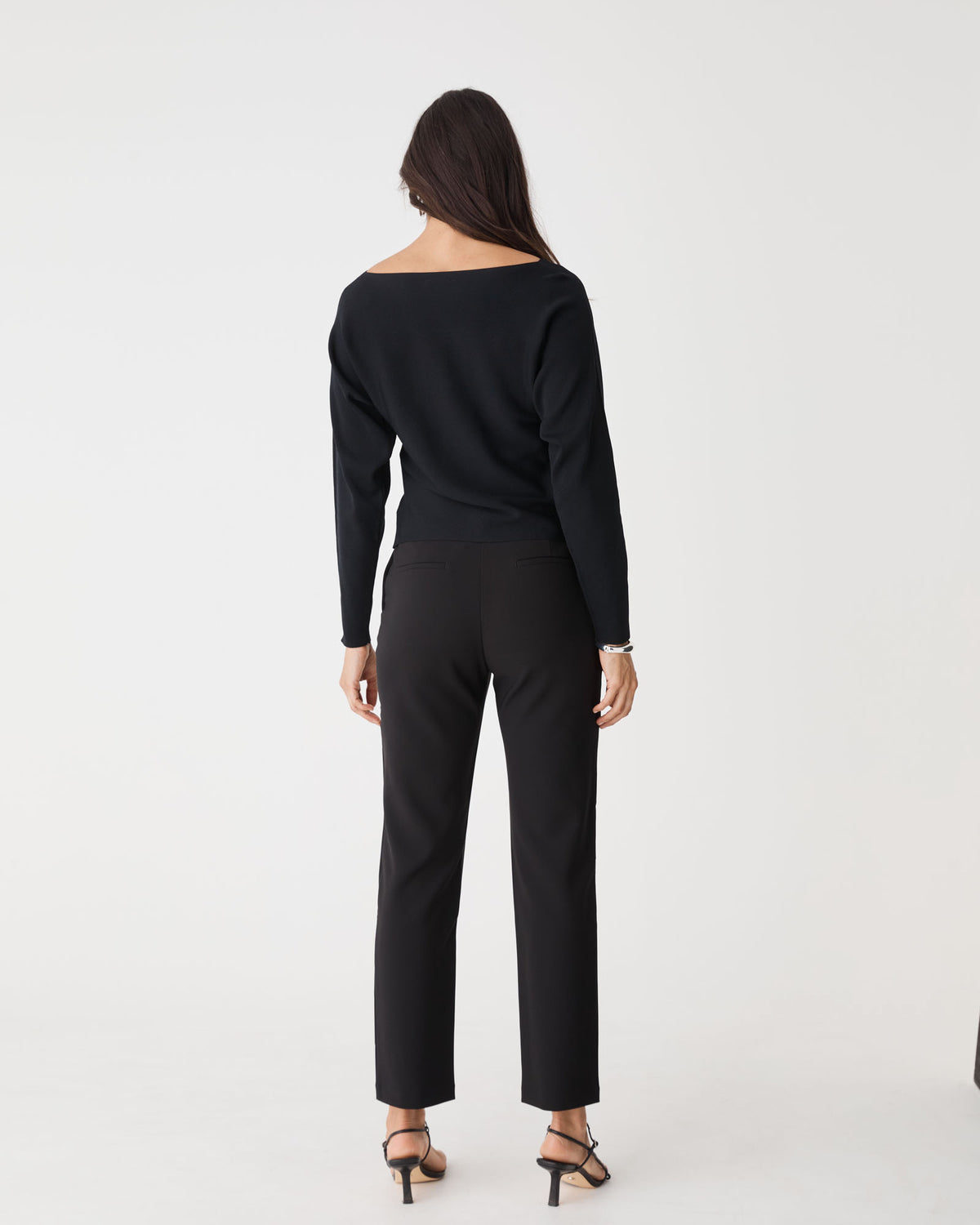 Jamie Dolman Sleeve Knit in black — back view