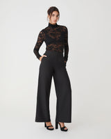 Torin Lace Turtleneck Top in black — full-length view